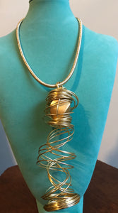 Wire Wrapped Gold Stone